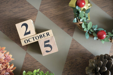 October 25, Date design with number cube.