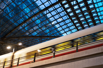 Moving train under the glass cover