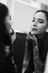 Tattooed Girl makes make-up