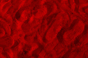 Closeup image of beautiful red sand grains with patterns for background.