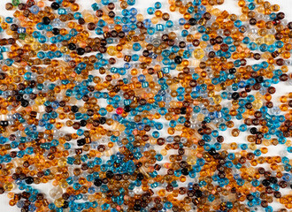 multicolored beads on white background