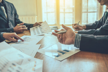 Business Corporate team brainstorming with chart and checking and analysis