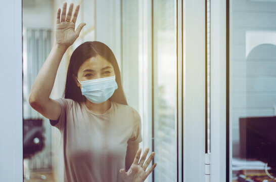Asian woman stay at home during coronavirus and covid-19 epidemic or pandemic,Social distancing concept