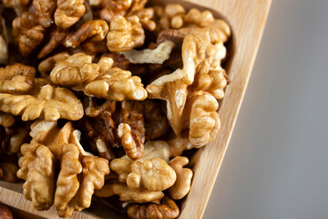 walnuts in a wooden plate