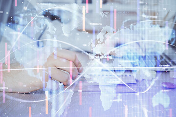 Multi exposure of businessman working on laptop on background. International business hologram in front. Concept of success.