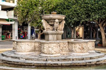 Morosini Fountain (also known  as Lions Square) in the center of  Heraklion city. Venetian fountain features four lions supporting the main dasin.