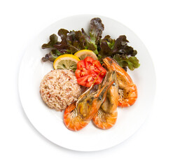 Brown Rice with Grill Shrimp healthy food cleanfood decorate carved tomato, lemon slice and leaf red Oak  top view isolated on white background
