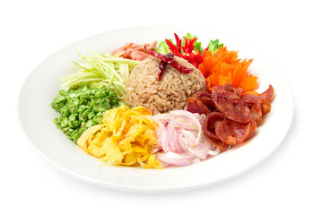 Rice seasoned with shrimp paste or rice mix slice of red onion, bean,mango, fried egg, Thai food style fusion decorate with carved vegetables side view isolated on white background