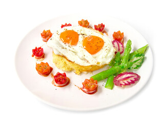 Breakfast with grilled toast on top fried eggs,sprinkle black peppers and salt decorate tomato cherry, asparagus, radish leaf and cucumber carved style side view