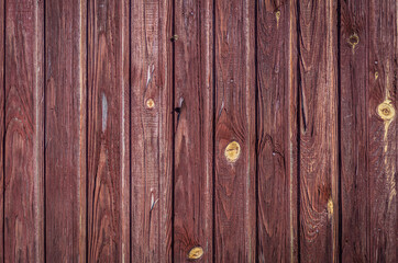 Wooden surface background vertical ragged brown painted board