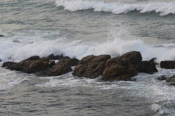 Brown Rock and Angry sea waves at Indian Ocean Sea view in Kanya Kumari