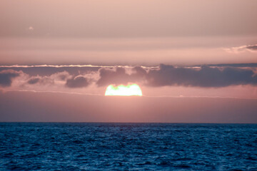 The Sun Setting in the Sea , digitally created photo image