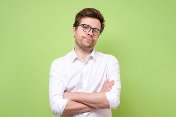 man looking in contempt, feeling loathing and disgust towards something