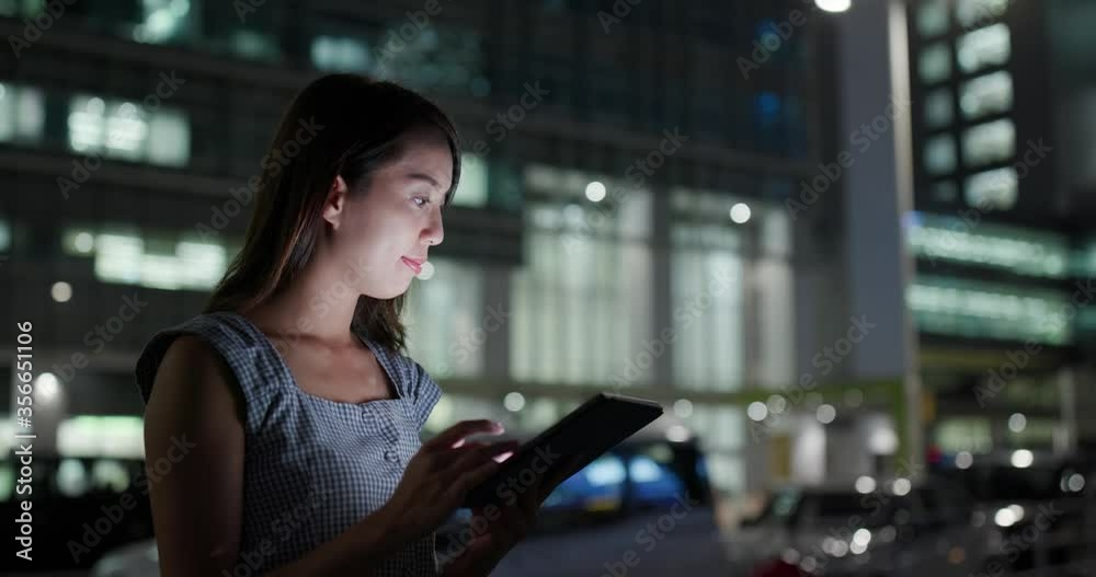 Poster Woman use of digital tablet at street