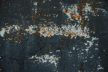 Rusty metal surface with blue paint residue as background image. Copy, empty space for text