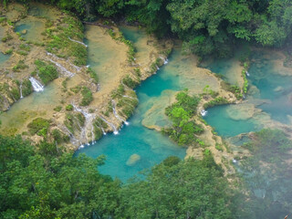Fototapeta na wymiar Natrual water pools of Semuc Champey Aerial Perspective in Guatemala