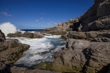 Fototapeta na wymiar Sardegna - rocce e onde