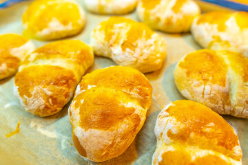 Handmade delicious fresh rolls with crusty tops. Fresh rolls from the oven.