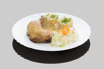 Romanian traditional dishes - chicken legs with rice and cabbage salad