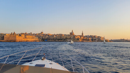 Valletta skyline at sunset - view from a yacht