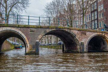 A bridge over the narrow canals of Amsterdam in Holland