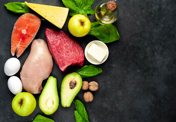 Healthy low carbohydrate foods on stone background. Healthy eating.
Copy space for your text.