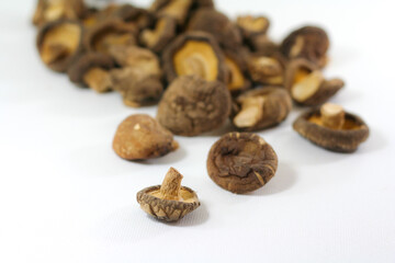 Fototapeta na wymiar Dried Shiitake mushrooms on white background