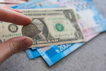 The ruble and the dollar.