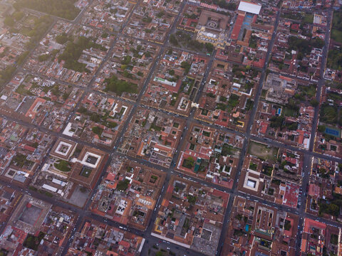 Drone Aerial View Of Colonial City Antigua Guatemala At Sunset