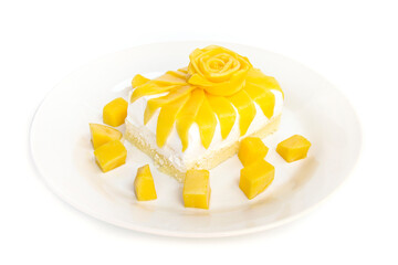 Milk Cake and cream with Mango flower shape carved style the best dessert or bakery popular on summer in Thailad side view isolated on white background