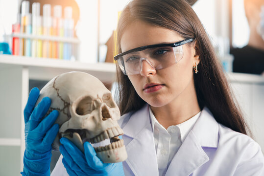 the scientists are analyzing the component models of the human body in the laboratory. the concept of coronavirus, vaccination, laboratory and medical.