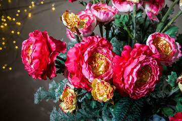 top view closeup exquisite bouquet made from large artificial red peonies