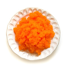 Tobiko egg is orange (flying fish roe) on white plate. Fushion food style Japanese for cooking rice don,nikiri or sushi top view isolated on white background