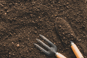 Loam for planting and agricultural tools.