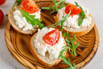 Healthy and tasty snack with bread, tomatoes and cottage cheese