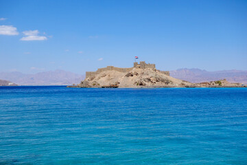 Egypt, Taba, Saladin castle, view from the sea, a fortress with towers and flag