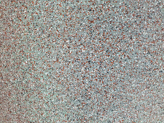 The pigment of the plastic spreads into small dots.abstract background.The surface is rough.monochrome color.
