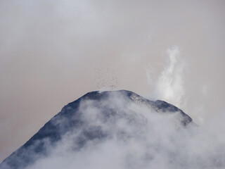 Volcano Fuego spitting lava and smoke, Guatemala