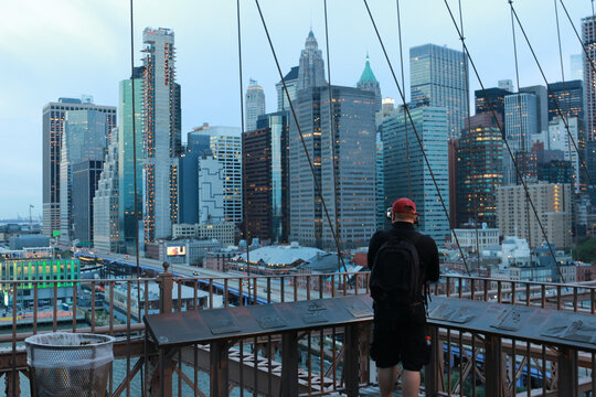 A photographer shots pictures of the Skyline of New York