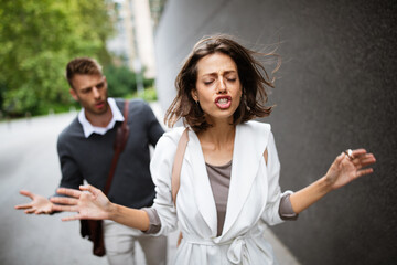 Fototapeta na wymiar Frustrated couple arguing and having marriage problems