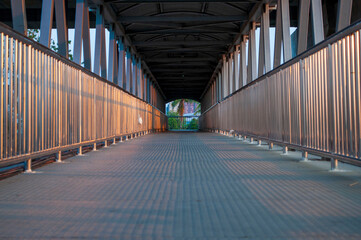 Walkway on the iron bridge in the city