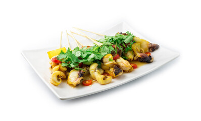 Squid Grilled with bamboo sticks inside dish