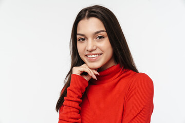 Photo of joyful young woman posing and laughing at camera
