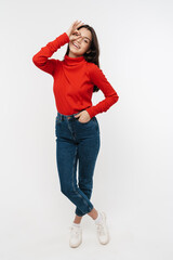 Photo of joyful caucasian nice woman smiling and gesturing ok sign