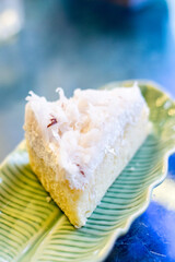 Blurr piece of soft cream coconut cake  