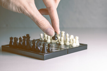 Chess, white and black on the Board, close-up.