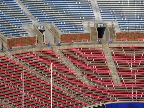 Empty seats of a football stadium before a game