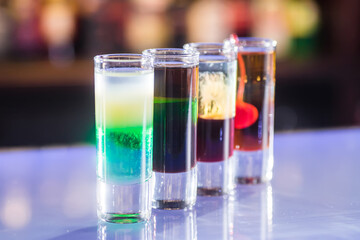 Four shots cocktail on the bar