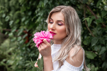 Enjoy spring without allergy. Springtime bloom. Pollen allergy. The girl suffers from pollen allergy during the spring flowering