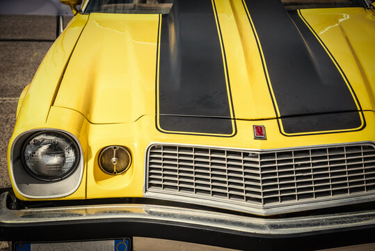 Front view of a yellow Classic Chevrolet Camaro